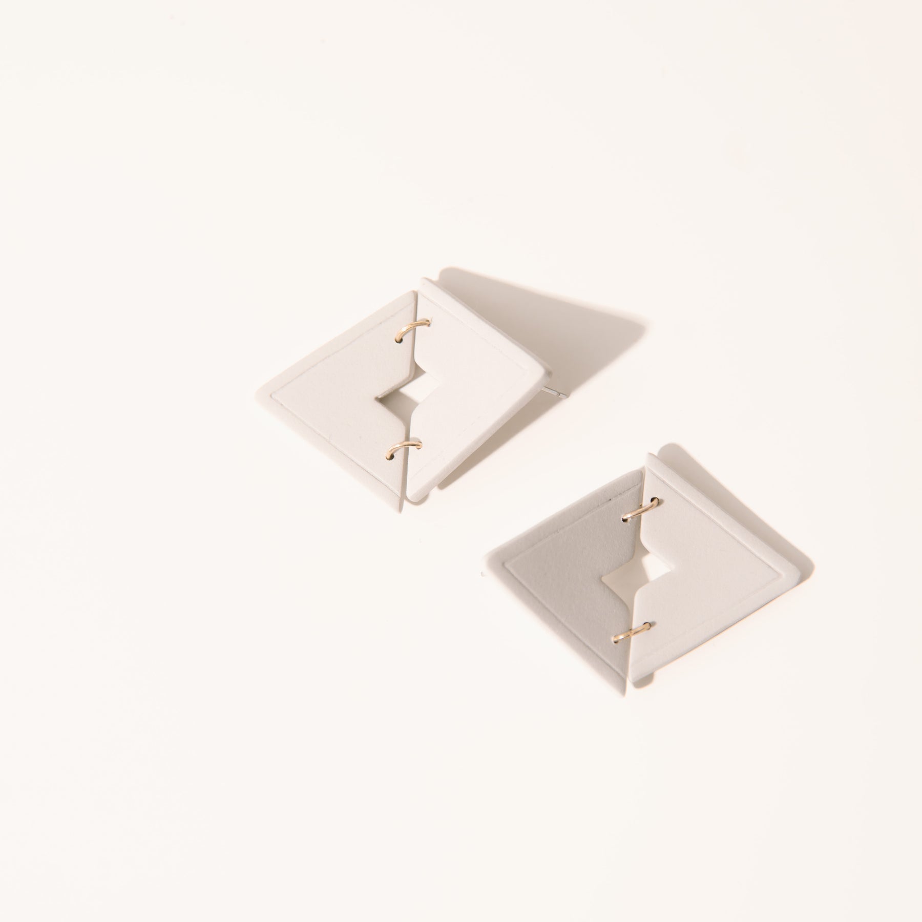 Cream Triangle Dangle Studs