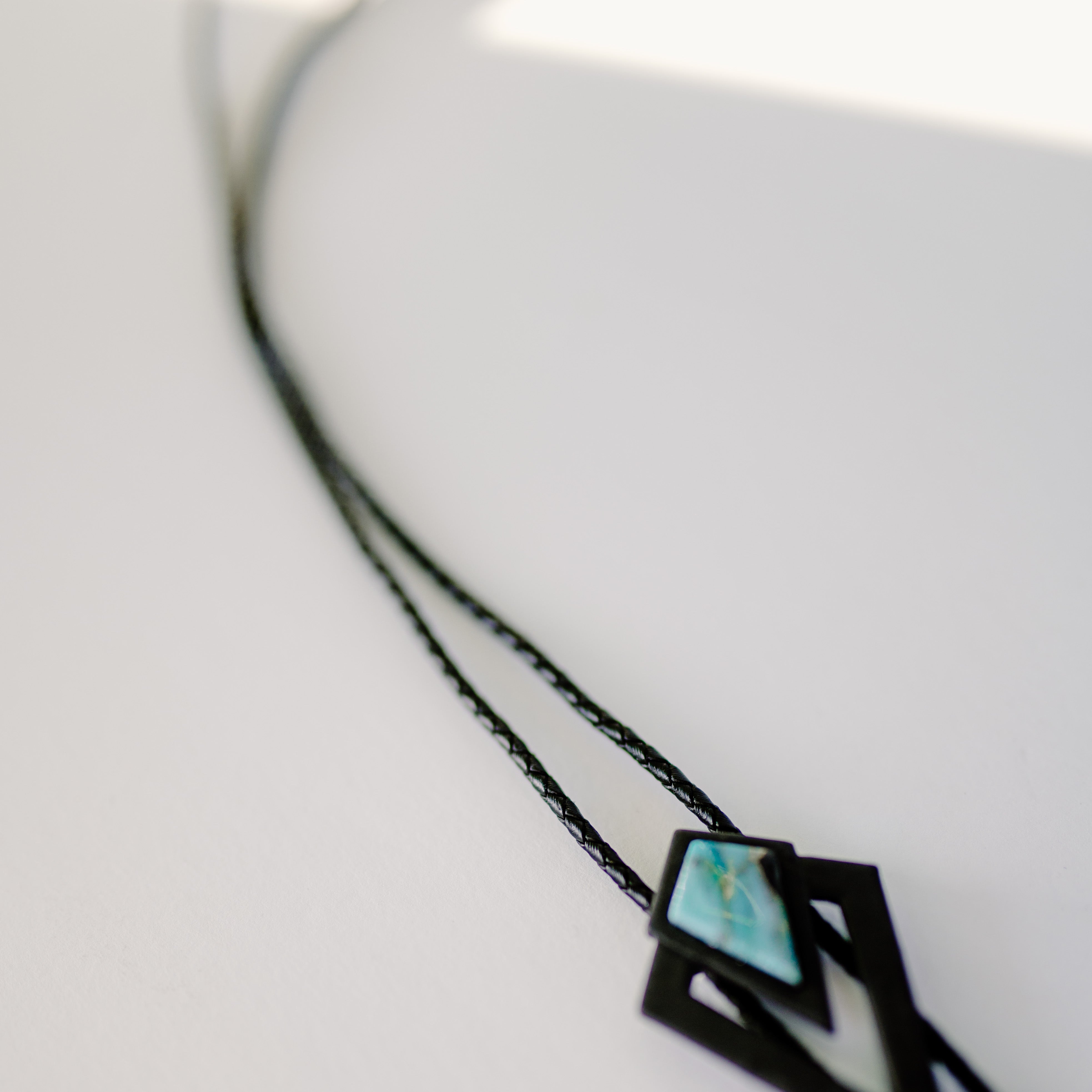 Black and Turquoise Stone Bolo