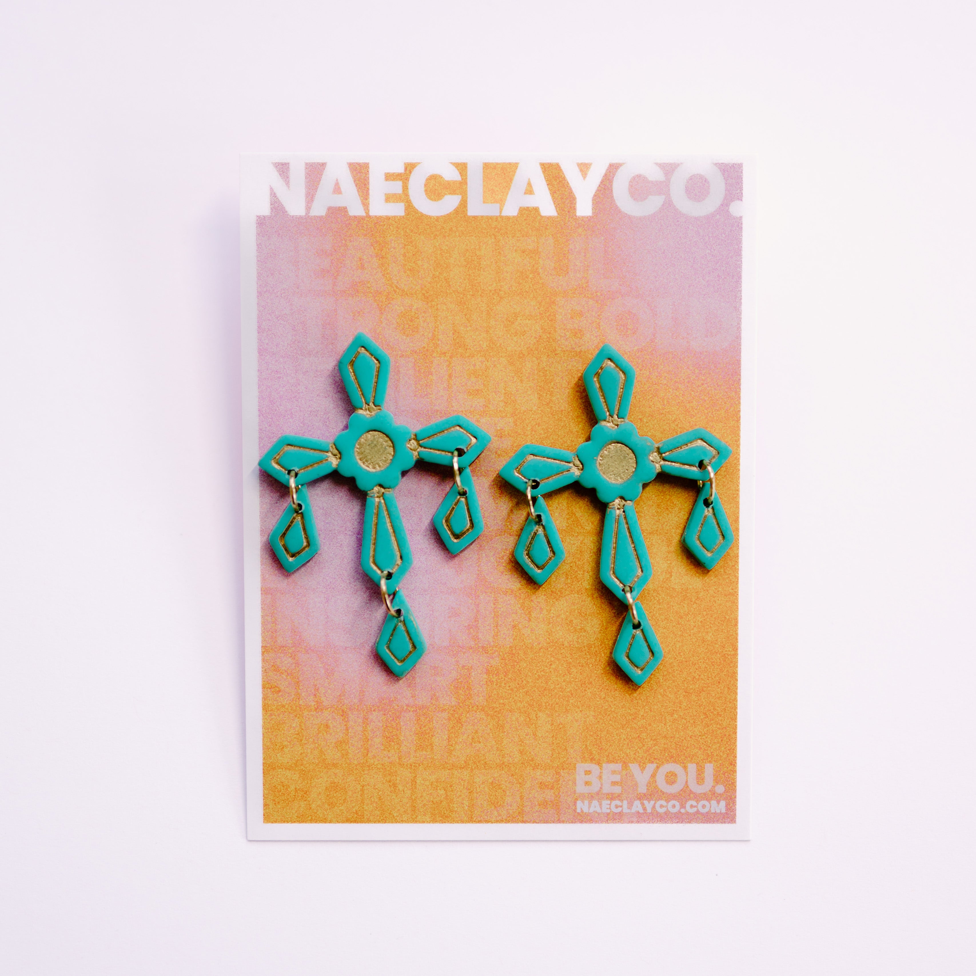 Turquoise Reign Chandelier Cross Earrings